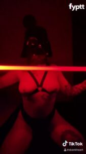 Girl With Darth Vader Mask and Lightsaber Showing Her Tits on NSFW TikTok