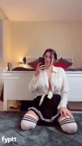 Big Tits TikTok Thots Pokes Her Phone and Gets Naked in Front of the Mirror