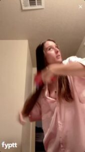 Girl Shows Nip Slip While Combing Her Hair on Live TikTok