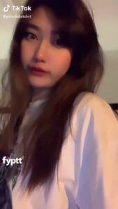 2001 Asian thot hides her brown nipple on TikTok with blur filter