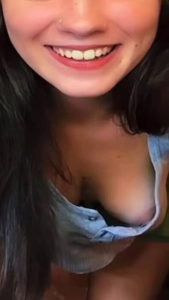 Beautiful brunette accidentally shows her pirced nipple on livestream